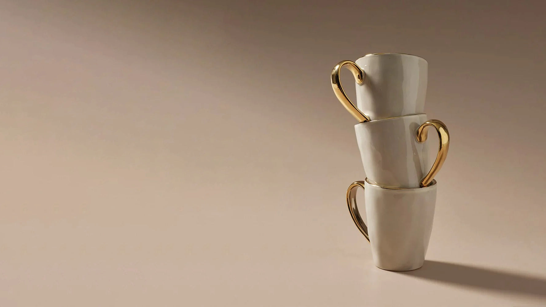 stack of three senseo mugs on a plain background, product image